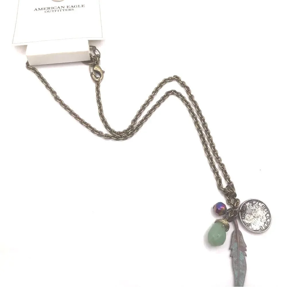 American Eagle Outfitters Brass and Green Feather Pendant Necklace